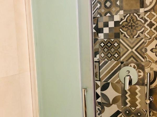 Atipico B&B : photo 10 de la chambre chambre quadruple avec salle de bains privative