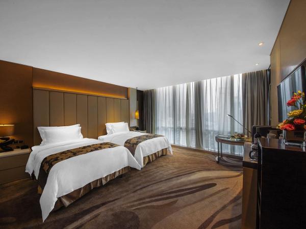 Shenzhen Futian Wyndham Grand : photo 3 de la chambre chambre lits jumeaux supérieure