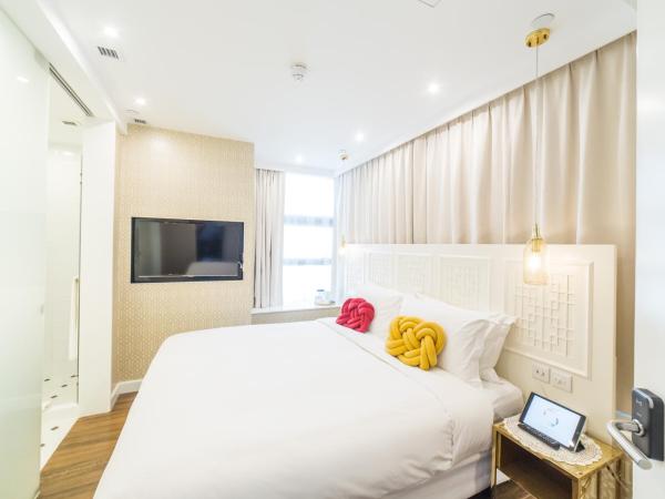Tung Nam Lou Art Hotel : photo 3 de la chambre chambre lits jumeaux supérieure confort