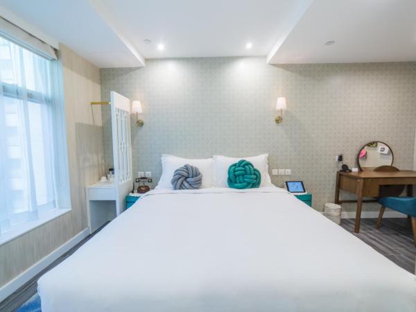 Tung Nam Lou Art Hotel : photo 4 de la chambre chambre double deluxe