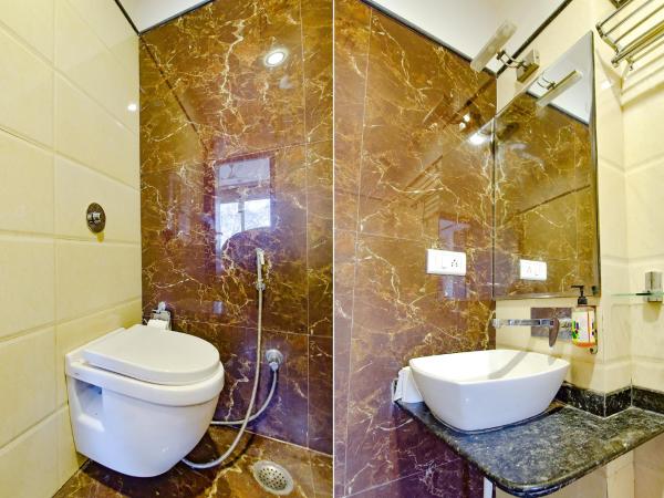 FabHotel Resolute Gopalpura : photo 4 de la chambre chambre deluxe