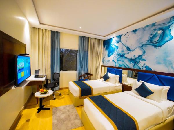 Quality Inn Rockwell Grand, Bangalore : photo 3 de la chambre chambre lits jumeaux supérieure - vue sur jardin