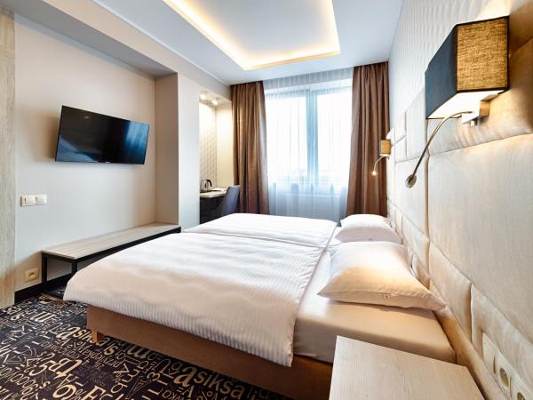 Citi Hotel's Łódź : photo 1 de la chambre chambre double ou lits jumeaux supérieure