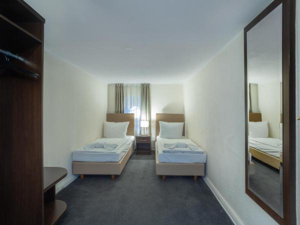 Hotel BELLEVUE am Kurfürstendamm : photo 3 de la chambre appartement 3 chambres