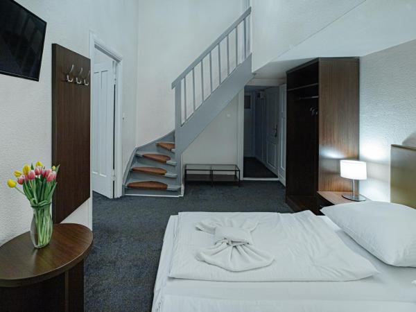 Hotel BELLEVUE am Kurfürstendamm : photo 6 de la chambre appartement 3 chambres