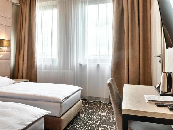 Citi Hotel's Łódź : photo 2 de la chambre chambre lits jumeaux standard