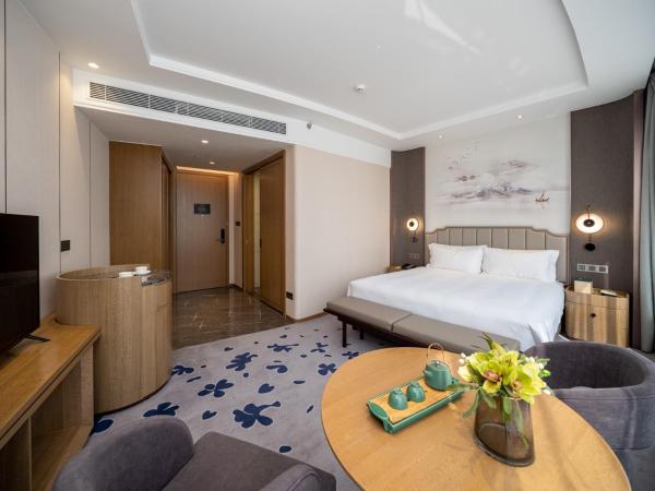 Kyushu Joycheng Hotel : photo 3 de la chambre chambre lit king-size - vue sur montagne