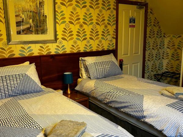 Acer Lodge Guest House : photo 2 de la chambre chambre lits jumeaux