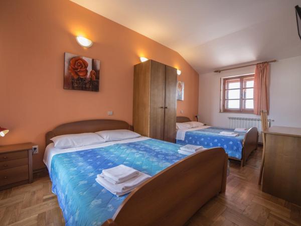 Pansion Valbruna : photo 2 de la chambre appartement familial