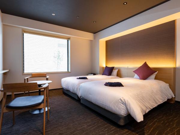 The358 SORA : photo 1 de la chambre chambre lits jumeaux