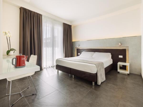 Baldinini Hotel : photo 5 de la chambre chambre double ou lits jumeaux - vue partielle sur mer