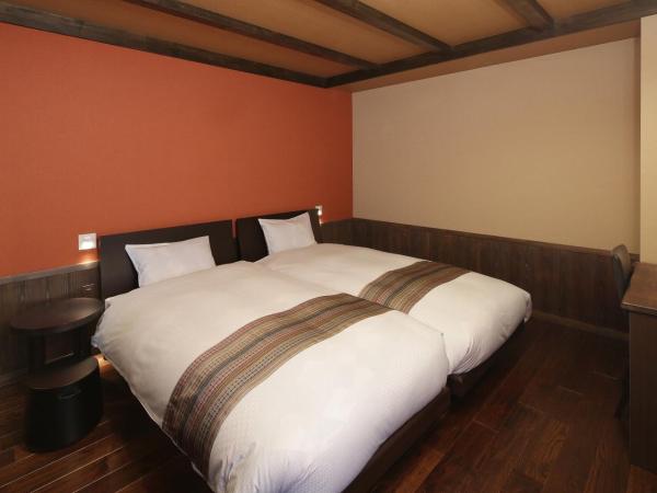 Kyomachiya Ryokan Sakura Urushitei : photo 2 de la chambre chambre lits jumeaux