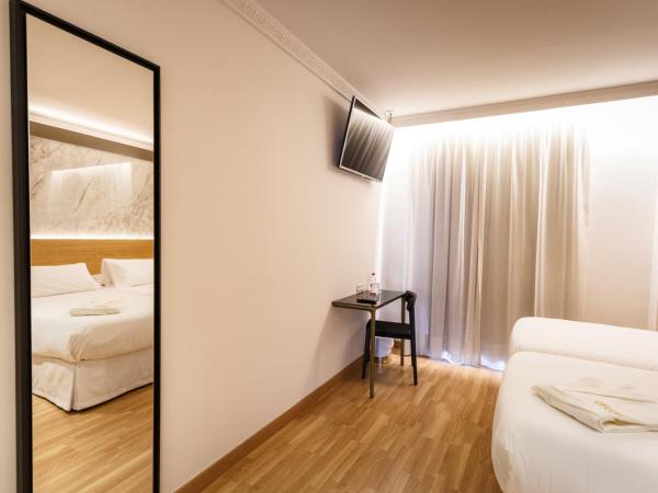 Hotel Dauro Premier : photo 1 de la chambre chambre simple