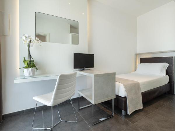 Baldinini Hotel : photo 8 de la chambre chambre triple - vue partielle sur mer