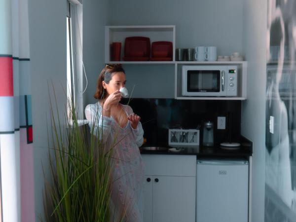 The Cove By Renzzi : photo 8 de la chambre suite dotée d'un lit king-size