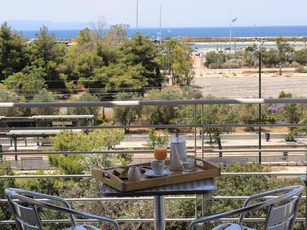 IKAROS Hotel ELLINIKO : photo 5 de la chambre chambre double ou lits jumeaux - vue latérale sur mer