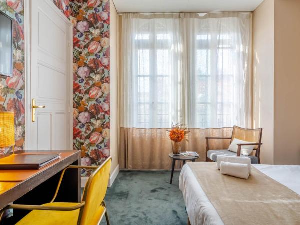 Ama Hôtel : photo 3 de la chambre chambre double confort avec baignoire