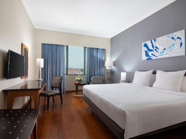 Kimaya Sudirman Yogyakarta by Harris : photo 3 de la chambre chambre deluxe double ou lits jumeaux