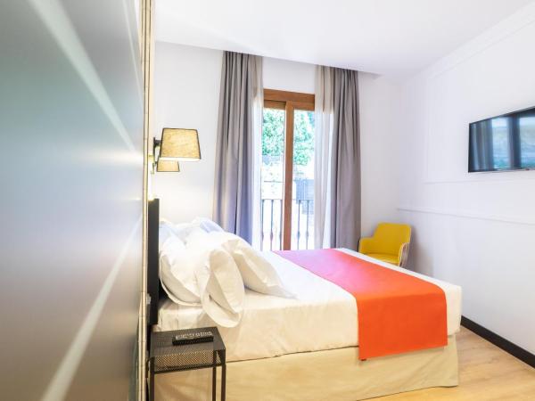 Hotel Boutique Puerta de las Granadas : photo 2 de la chambre chambre supérieure & romantique mauror