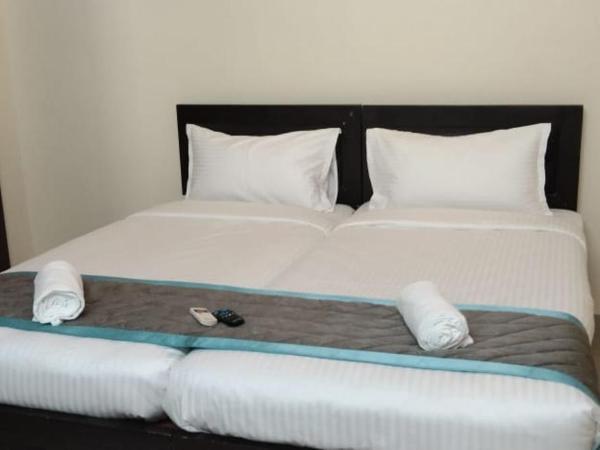 Trinetraa Inc : photo 1 de la chambre chambre lits jumeaux standard