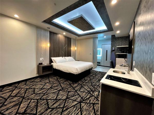 SureStay Hotel by Best Western Houston Southeast : photo 1 de la chambre chambre lit king-size avec kitchenette - non-fumeurs