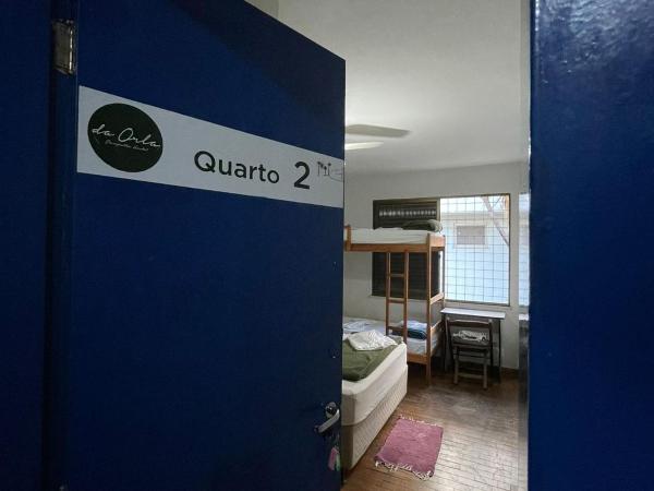 Da Orla Pampulha Hostel : photo 2 de la chambre chambre quadruple avec salle de bains commune