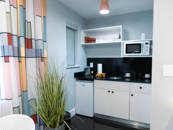 The Cove By Renzzi : photo 10 de la chambre suite dotée d'un lit king-size