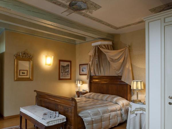 Domus Nova Palace - Italian Homing : photo 2 de la chambre chambre double – vue sur ville
