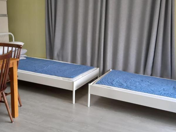 Hans House : photo 4 de la chambre chambre familiale avec salle de bains privative