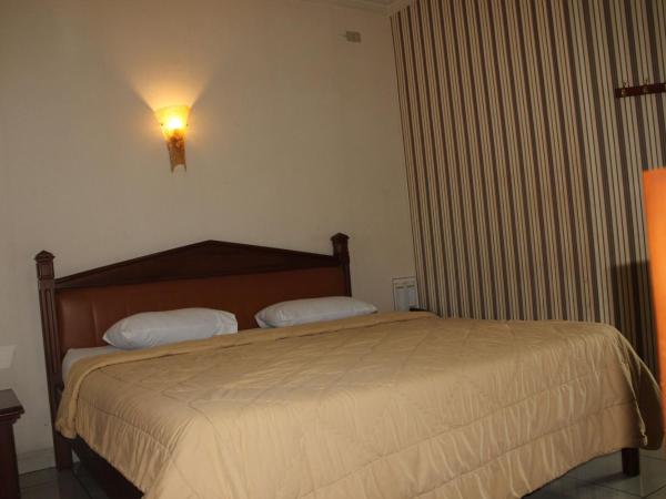Hotel 678 Cawang powered by Cocotel : photo 1 de la chambre chambre double standard