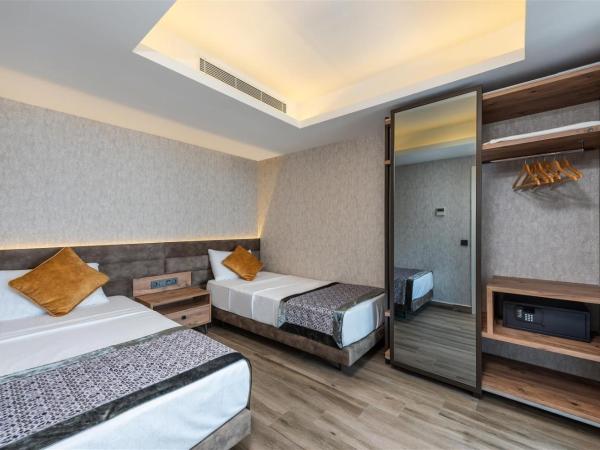 Elite Luxury Suite & Spa : photo 4 de la chambre chambre quadruple - vue sur mer