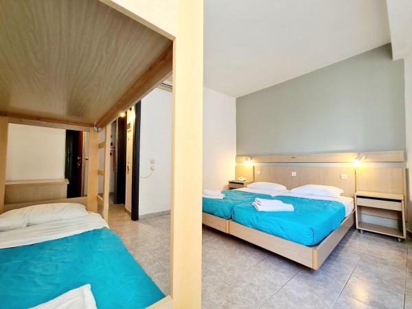 G92 City Hotel : photo 3 de la chambre chambre quadruple avec salle de bains privative