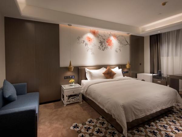 Paco Hotel Dongpu Guanghzou -Free Shuttle Bus for Canton Fair : photo 1 de la chambre chambre lit king-size deluxe