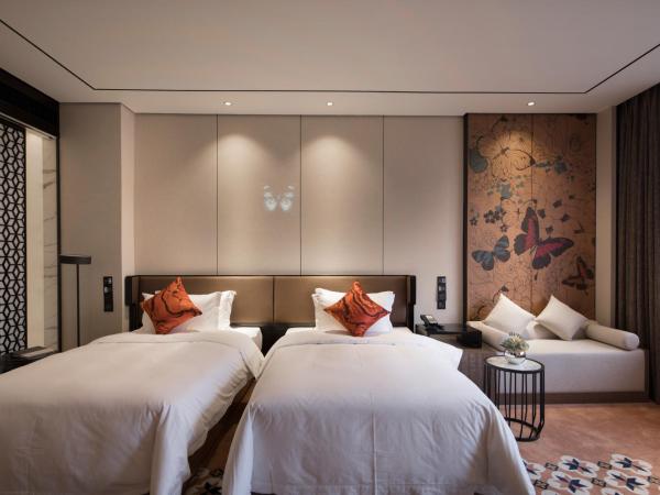 Paco Hotel Dongpu Guanghzou -Free Shuttle Bus for Canton Fair : photo 8 de la chambre chambre lits jumeaux exécutive