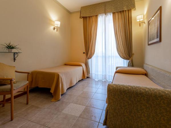 Hotel Relax : photo 3 de la chambre chambre quadruple
