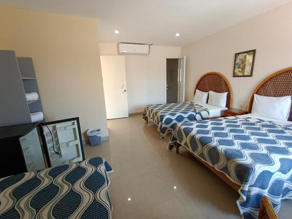 Hotel Playa de Oro - Enfrente de WTC y Plazas Comerciales : photo 4 de la chambre chambre familiale