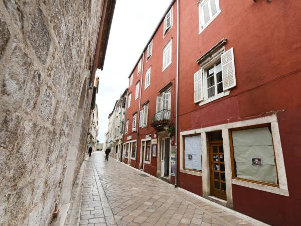 Peninsula Luxury Rooms : photo 3 de la chambre chambre lit king-size supérieure