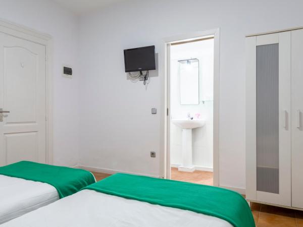 Monrooms Barcelona : photo 9 de la chambre chambre lits jumeaux