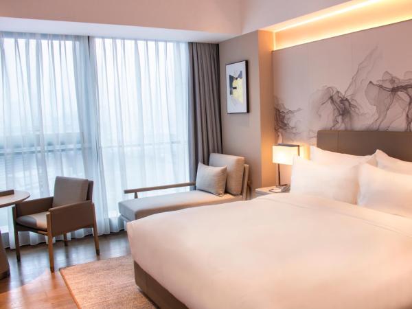 LN Dongfang Hotel Pazhou-Free Shuttle Buses and Registration Counter for Purchasing Agents during the Canton Fair : photo 2 de la chambre chambre double deluxe