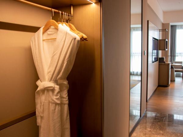 LN Dongfang Hotel Pazhou-Free Shuttle Buses and Registration Counter for Purchasing Agents during the Canton Fair : photo 5 de la chambre chambre lits jumeaux exécutive