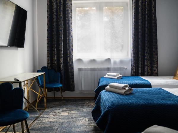 Pensjonat Wrzos : photo 2 de la chambre chambre triple confort