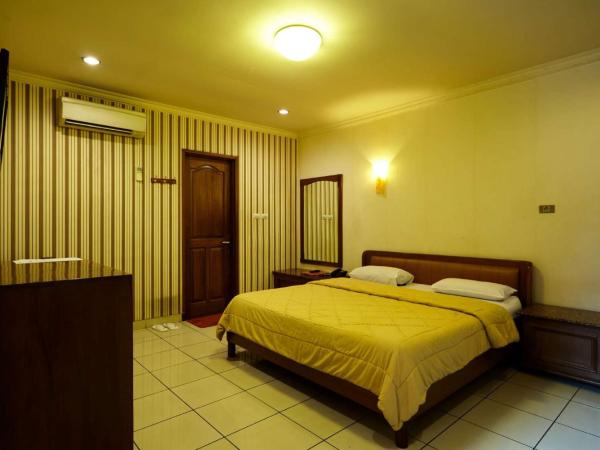 Hotel 678 Cawang powered by Cocotel : photo 1 de la chambre chambre double supérieure