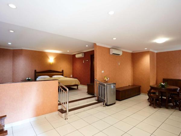 Hotel 678 Cawang powered by Cocotel : photo 1 de la chambre suite - vue sur ville