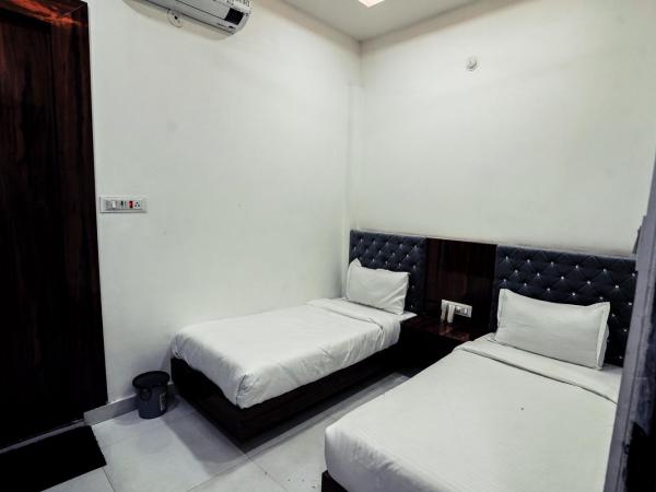 Shri Govindam Hotel : photo 4 de la chambre chambre lits jumeaux deluxe