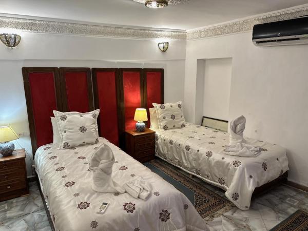 Riad Damia Suite &Spa : photo 1 de la chambre petite chambre lits jumeaux