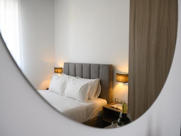 AMALPHI Corfu City Living : photo 1 de la chambre chambre familiale deluxe