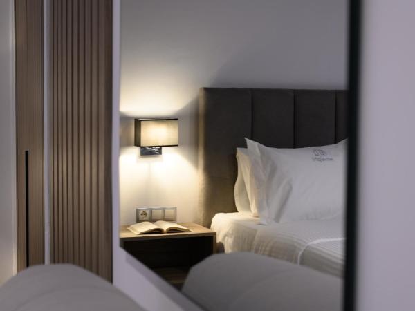 AMALPHI Corfu City Living : photo 4 de la chambre chambre familiale deluxe