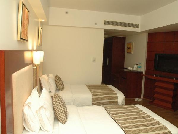 Sarovar Portico Jaipur : photo 3 de la chambre premium room with twin bed and 2 pints of beer and 20% discount on fnb