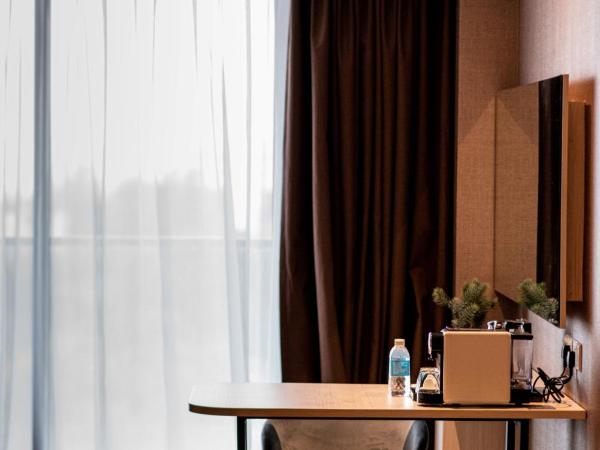 The Aru Hotel at Aru Suites : photo 4 de la chambre chambre de luxe avec vue sur la mer