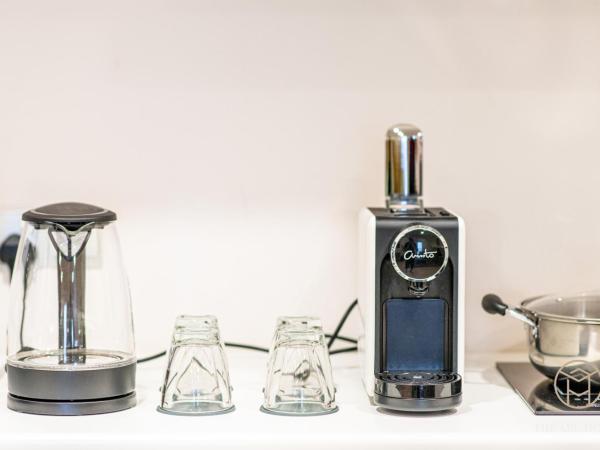 The Aru Hotel at Aru Suites : photo 3 de la chambre suite exécutive 2 chambres